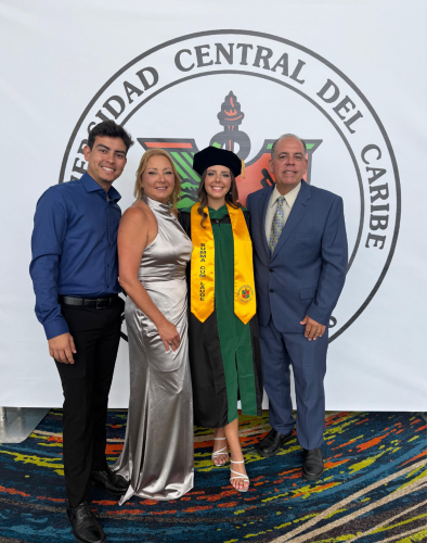 Kaylee Boschetti-Santana with her brother and parents at graduation.